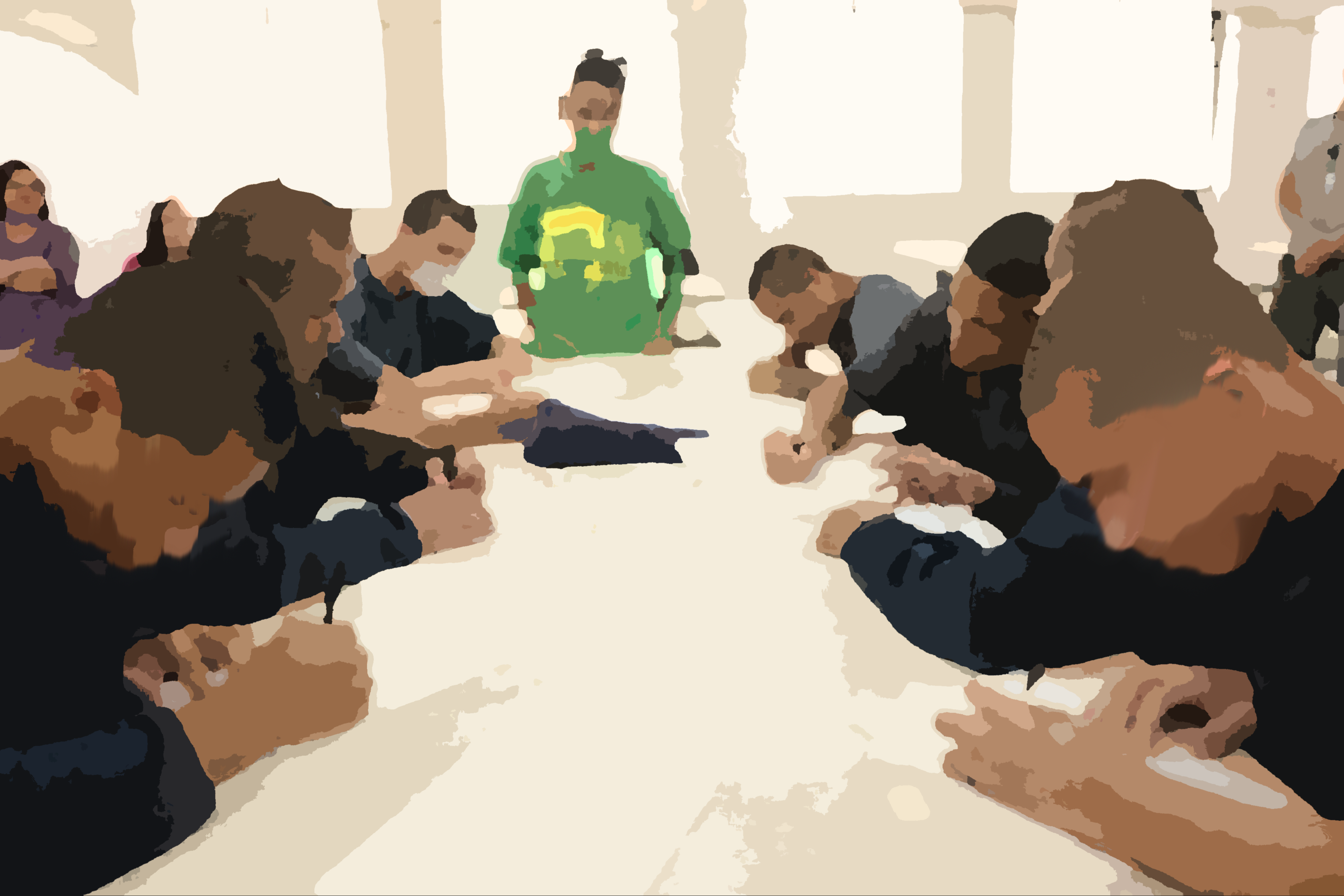 Foto colorida borrada mostrando os jovens da Fundação Casa em atividade de escrita